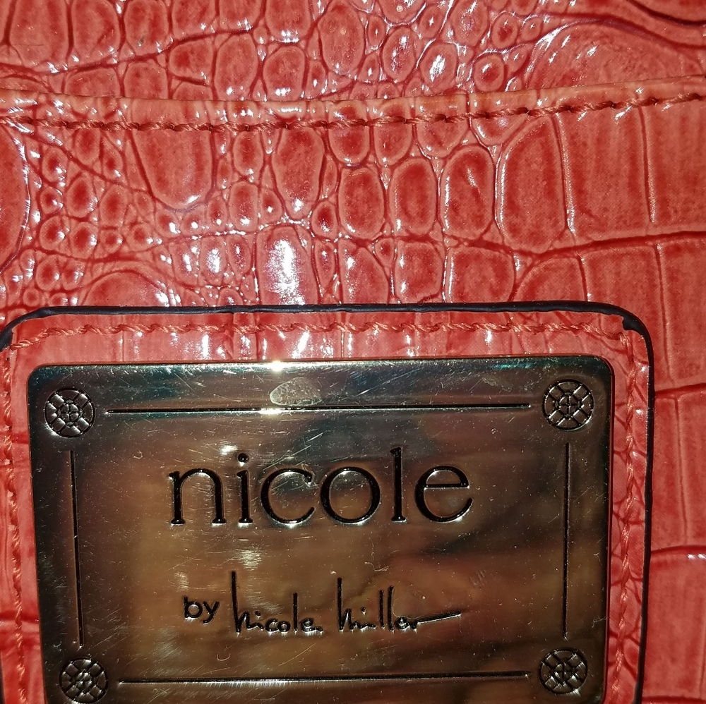 Beautiful Nicole Miller purse.

Please go to my pa - Picture 5 of 5
